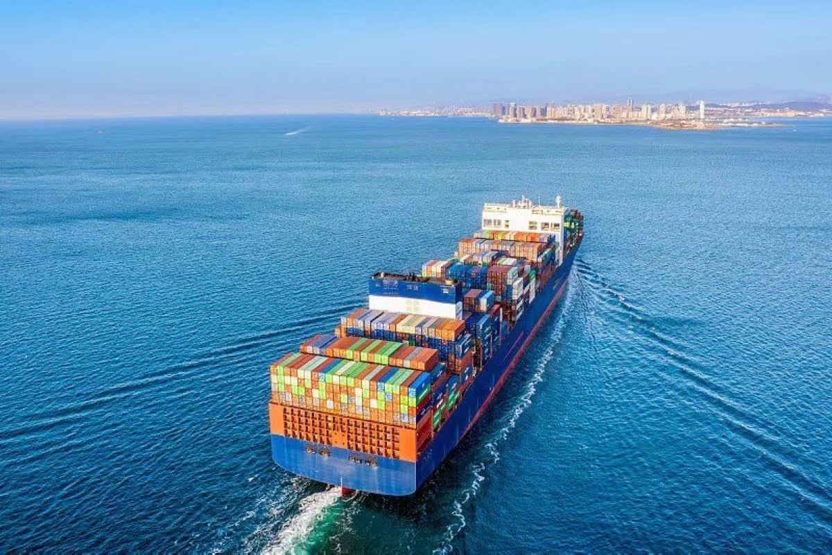Container vessel traveling toward a coastal port